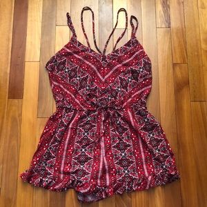 Red and black patterned romper